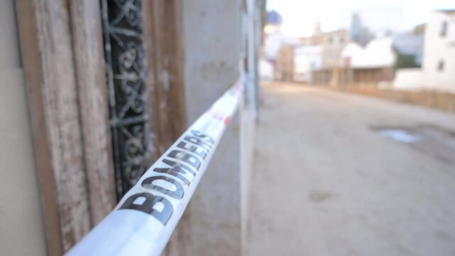 Firefighters' security seal on a house destroyed by severe flooding in Chiva, Valencia. Effects of the DANA