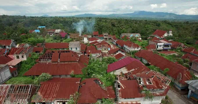Aerial drone shot of destroyed and abandoned village near Vulcano Sinabung in Indonesia