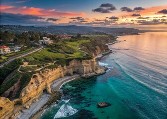 Obraz premium Majestic Aerial View of La Jolla's Stunning Coastline and Cliffs at Sunset with Lush Greenery and Crystal Clear Waters, Showcasing the Natural Beauty of California's Coastal Paradise