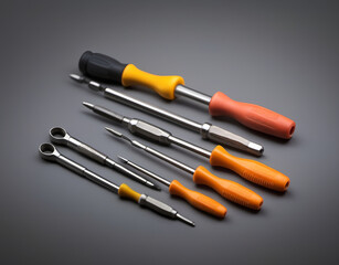 Close-up of insulated screwdrivers with various sizes laid on a neutral background. Generative AI