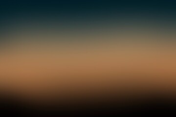 Obraz premium A blurred gradient background, transitioning from a dark blue at the top to a warm brown at the bottom. Soft, dreamy atmosphere background perfect for background, various creative design