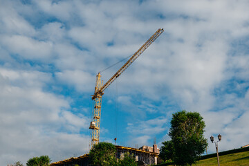 construction crane on a blue sky background