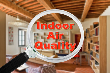 INDOOR AIR QUALITY CONCEPT with residential home interior and magnifying glass