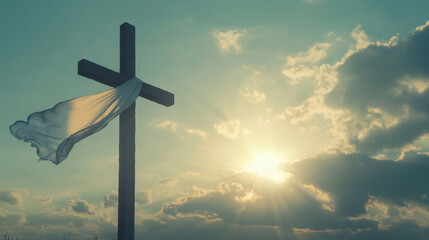 tall wooden cross stands against dramatic sky, with flowing white cloth gently waving in breeze. sun shines brightly, casting warm glow, evoking sense of peace and hope