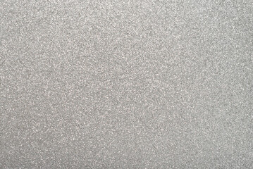 Silver glitter texture. Silver glitter background.