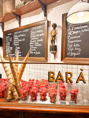 Strawberry with chocolate in waffle desert display at the store 