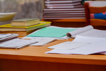 Books and office supplies on the table