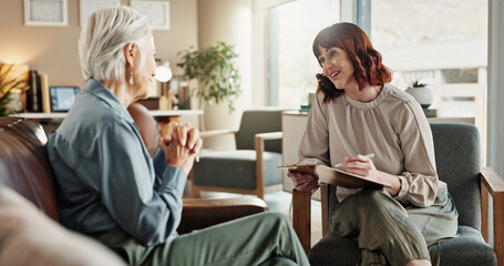 Psychologist, chat and senior woman with notes and smile from mental health assessment in...