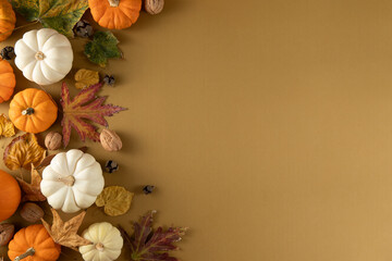 Naklejka premium Autumn Background with Pumpkins on Brown Background