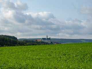 Neresheim, Germany - September 30th 2023: The famous monastery surrounded by hills and forests