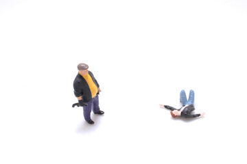 Toy Figures Depicting a Crime Scene Interaction on White Background