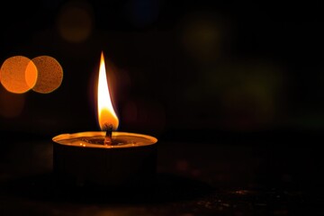 Candle In The Dark. Beautiful Burning Flame on Black Background, Romantic Candlelight