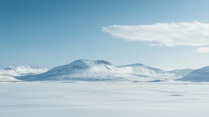 Majestic Snow-Covered Mountains Under a Pristine Sky