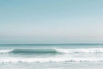 Fototapeta premium A person rides a surfboard on a sunny beach, ready for action
