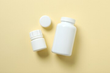 White bottles on color background 