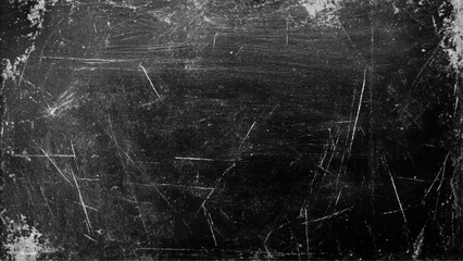 Black grunge scratched background with old film effect and dusty scary texture; space for text or design. Dark and scratched black grunge background, scratched black texture vintage film style.