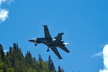 photographs of fighter jets, airplanes with power and elegance in the blue sky with white clouds