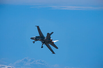 photographs of fighter jets, airplanes with power and elegance in the blue sky with white clouds