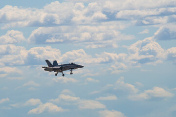 photographs of fighter jets, airplanes with power and elegance in the blue sky with white clouds
