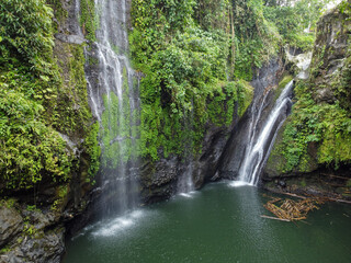 The drone view of Tebela Waterfall in Banyumas Regency, Central Java, Indonesia. It was taken on November 18, 2024 by a professional. It's a wonderful waterfall with a nice view