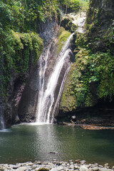 Fototapeta na wymiar The beauty of Tebela Waterfall in Banyumas Regency, Central Java, indonesia. It was taken on November 18, 2024 by a professional. It's a wonderful waterfall with a nice view