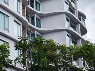 Detailed view of windows, doors and balconies of city buildings 