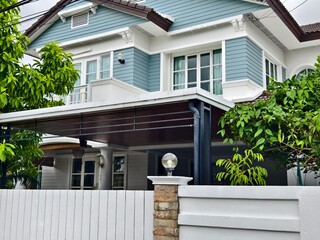 Detailed view of windows, doors and balconies of city buildings 