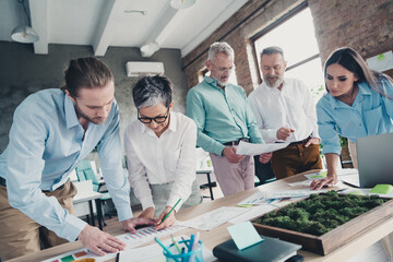 Fototapeta premium Photo of coworking project teamwork people discussion project work together conference meeting successful nice light office