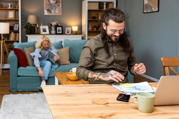 Career winner mindset. Young freelance businessman working at home. Confident dedicated male learning and educate himself for better opportunity in his business career, work online on laptop computer.