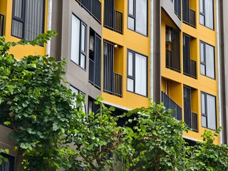 Detailed view of windows, doors and balconies of city buildings 