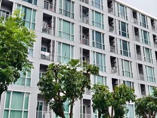 Detailed view of windows, doors and balconies of city buildings 
