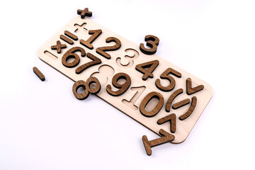 educational wooden number puzzle for kids on white background