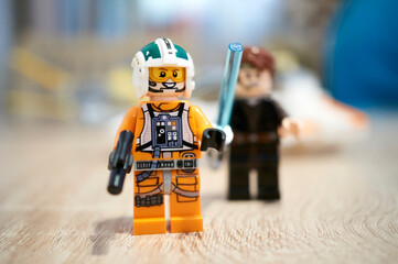 Fototapeta premium Close-up shot of Lego brand Star Wars Wedge Antilles star fighter toy figurines