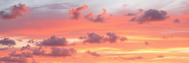 Obraz premium Vibrant colors of a beautiful sunrise with soft clouds in the sky, landscape, clouds
