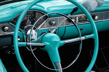 Interior of a classic american car. Detail of the interior of a vintage car. Retro car