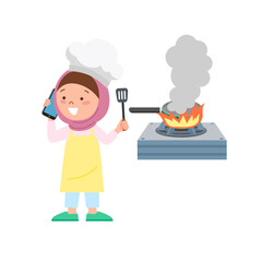A girl on the phone when the stove catches fire © Billedfab