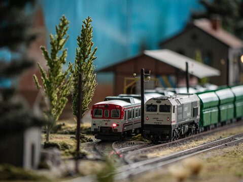 Ponferrada, Leon, Spain; 10-20-2024: Two locomotives from the Renfe and Renfe freight companies wait at the exit of a station just before the picket line at a model railway exhibition