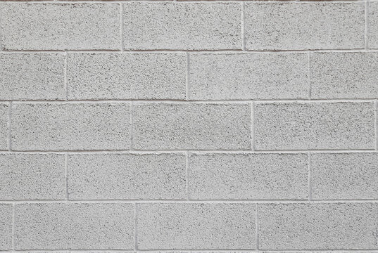 Mur en parpaings peints en gris