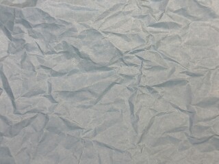 a background of crumpled paper. Beautiful multi-colored background for posters and advertisements. poster. paper. crumpled paper. multi-colored papers. 