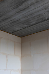 Ceiling from concrete slabs in a new unfinished apartment.