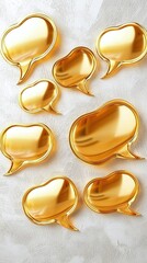 Golden Speech Bubbles on White Textured Background.