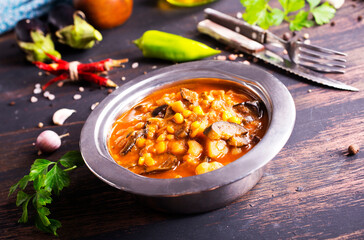 Vegetable stew. in metal bowl. Hot foodstuff.