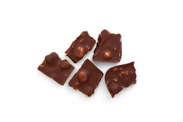 Milk chocolate with hazelnuts isolated on white background.