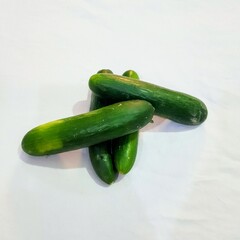 cucumbers on a wooden board