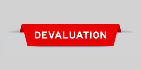 Red color inserted label with word devaluation on gray background