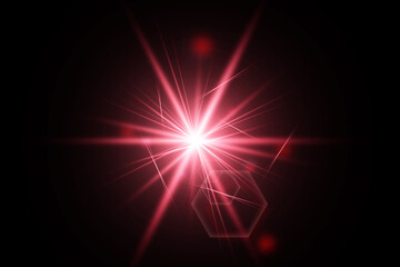 Beautiful optical red lens flare burst isolated on a black background