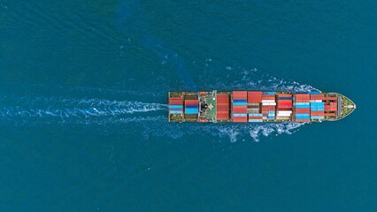 Aerial top view container ship full load container with beautiful wave.