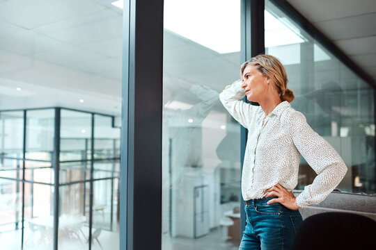 Thinking, window and business woman with stress for crisis, company fail and mistake. Office, corporate and mature person with worry, frustrated and upset for burnout, bankruptcy or unemployment risk