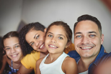 Fototapeta premium Portrait, happy and family with selfie at house for photography, bonding together and social media post. Smile, parents and children with profile picture update, love and safety for childhood memory
