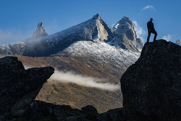 View of Ulamertorsuaq mountain and the view of surrounding mountains and glaciers in Tasermiut...
